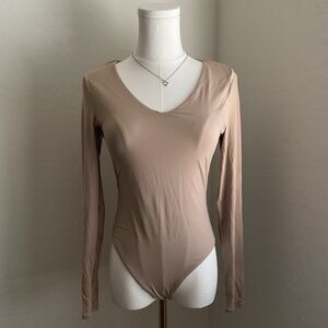 Elegant Tan Long Sleeve Bodysuit